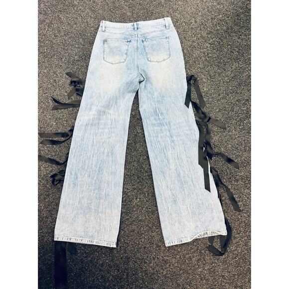 Alice + Olivia Blue Flare Jeans with Black Bow Accents - Picture 8 of 12